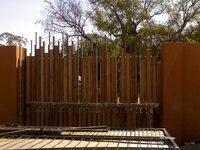 sliding gate with wood inserts