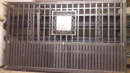 Custom sliding gate with detail